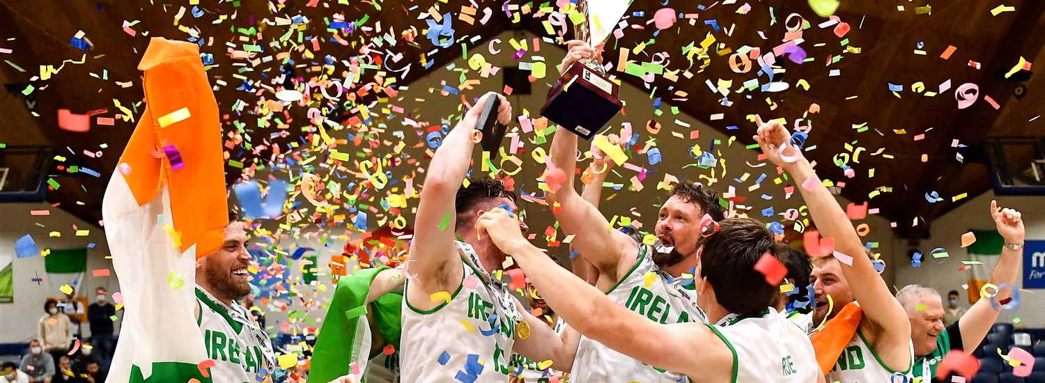 Irish players celebrate with the cup