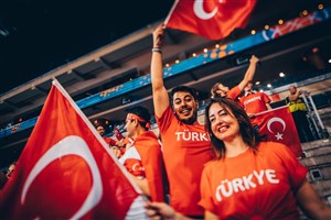 Fans of turkey in action during the game 