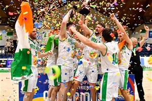 Irish players celebrate with the cup