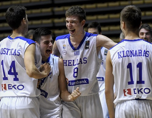 Greece's players celebrate after wining the final game.