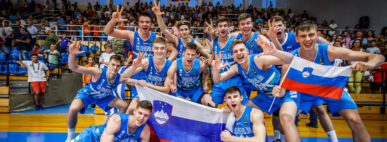 Players of Slovenia celebrate after winning bronze medal against Greece